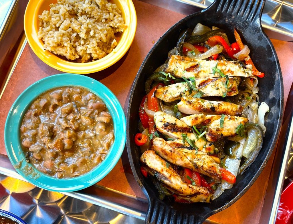 Sizzling chicken fajitas, a popular Mexican food dish, served at Las Cruces Tex Mex in Metairie.